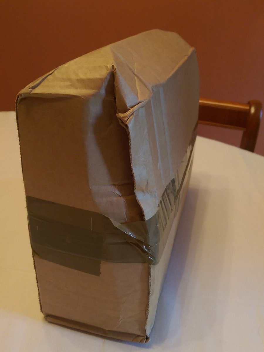 DidsburyDog's tweet photo. @RoyalMail awful state of package on delivery, left in plain view on driveway too. Luckily contents undamaged! https://t.co/73E2ilVU62
