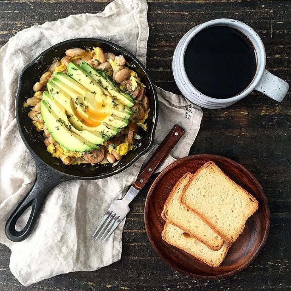 Cast_Iron_Cook's tweet image. White bean sausage scramble + avocado + harissa olive oil &amp;amp; brioche toast. 📷: @shellleybean