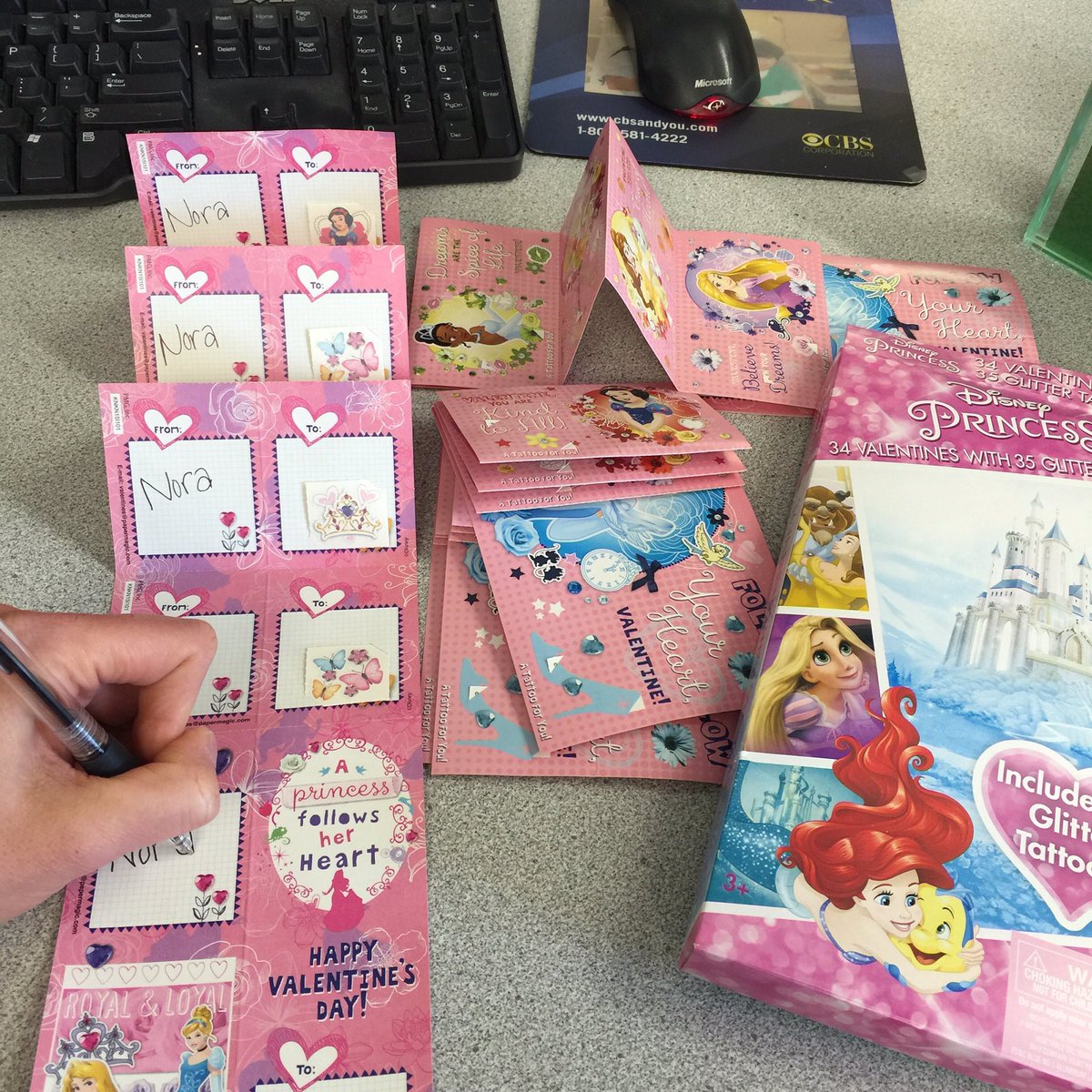 Y98's tweet photo. In between the news &amp; #Schmig, Jen is addressing her kids' Valentines. #momlife #aprincessfollowsherheart https://t.co/2J9oY6BPwC