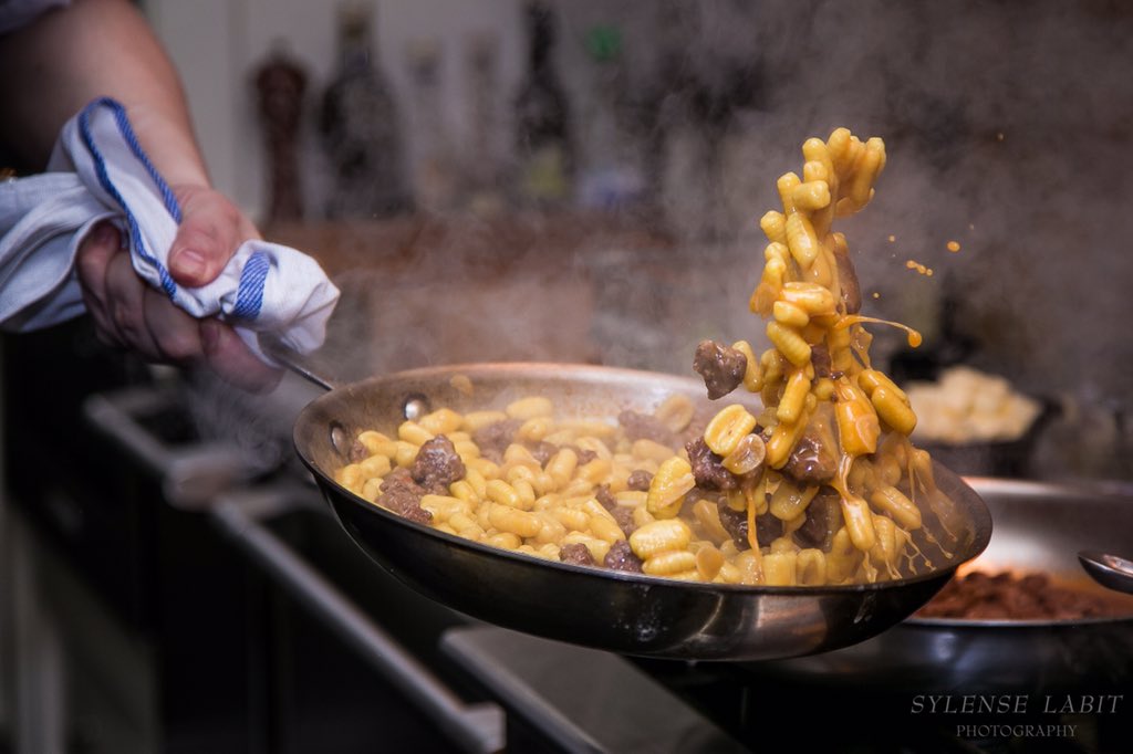 SCCulinarySuite's tweet photo. Action shot of Saffron Gnocchetti with pork sausage, dandelion greens & ricotta salata. #Dinnerfor36 https://t.co/fEzUcLqVFl