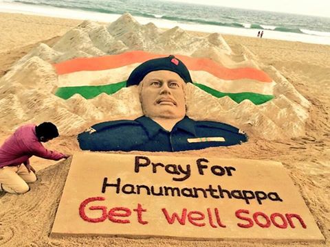 journalistadc's tweet photo. Sand artist #SudarsanPattnaik speaks for all of us in this brilliant sculpture.
#PrayForHanumanth #Hanumanthappa. https://t.co/TdPG1oIvBA"