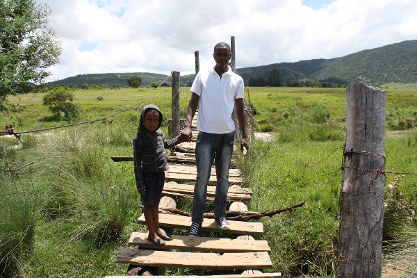 gofundme's tweet photo. Help #volunteers raise $4K to repair an old, unsafe bridge in this African village. https://t.co/3nLwzA16Er https://t.co/guMUZ2Scgj