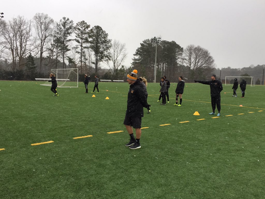 KSUOwlsWSOC's tweet photo. A snowy day in Georgia doesn't keep the Owls off the field.  #OwlStrong #GoKSUOwls https://t.co/QIsTkwKoFd