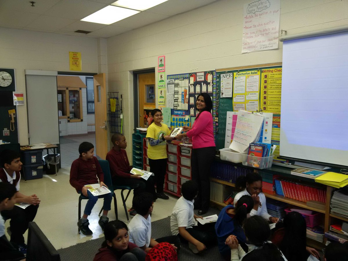 Advaith was presented with the book he won by taking part in the Just Read It Program.