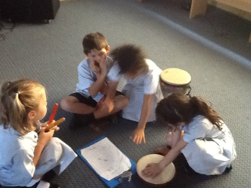 Year 1 Blue working together on Programme Music for The Three Billy Goats Gruff- look out for the troll -FORTISSIMO!
