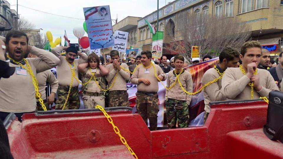 SattarSaeedi's tweet image. #Iran'ian demonstrators reenact #USMarines' capture, during the Islamic Revolution anniversary parade in Tehran.