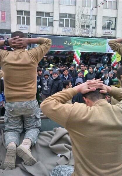 SattarSaeedi's tweet image. #Iran'ian demonstrators reenact #USMarines' capture, during the Islamic Revolution anniversary parade in Tehran.