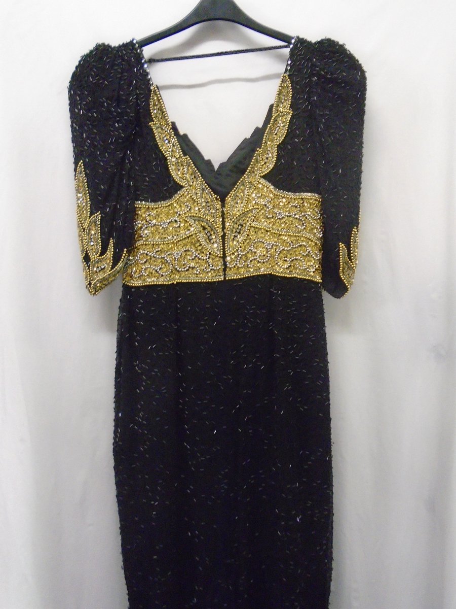 This <a href="/OlegCassini/">Oleg Cassini</a> dress exudes #glamour and extravagance. You won't want to give it a miss at just £35 #goldersgreen