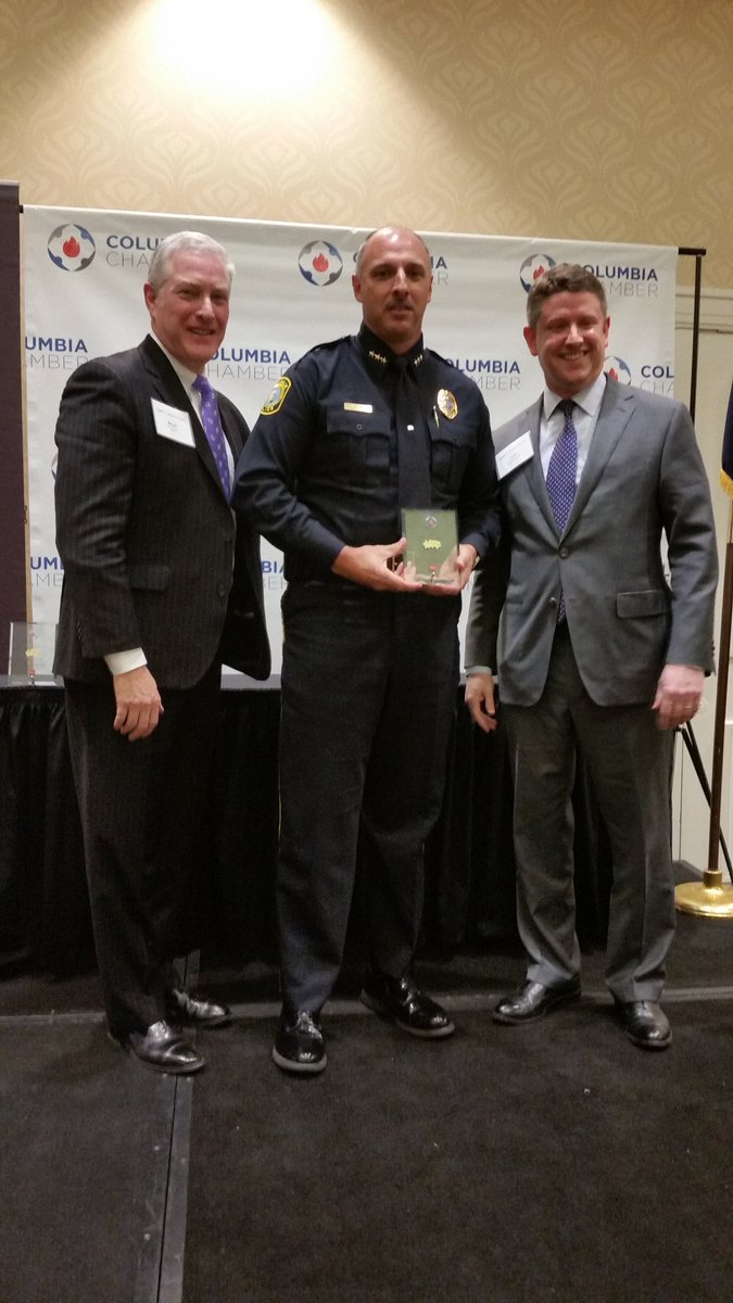 CityofColumbia's tweet photo. Chief Holbrook accepts the #YellowJasmineAward  for community impact on behalf of the @ColumbiaPDSC https://t.co/gUC3hbPm0i