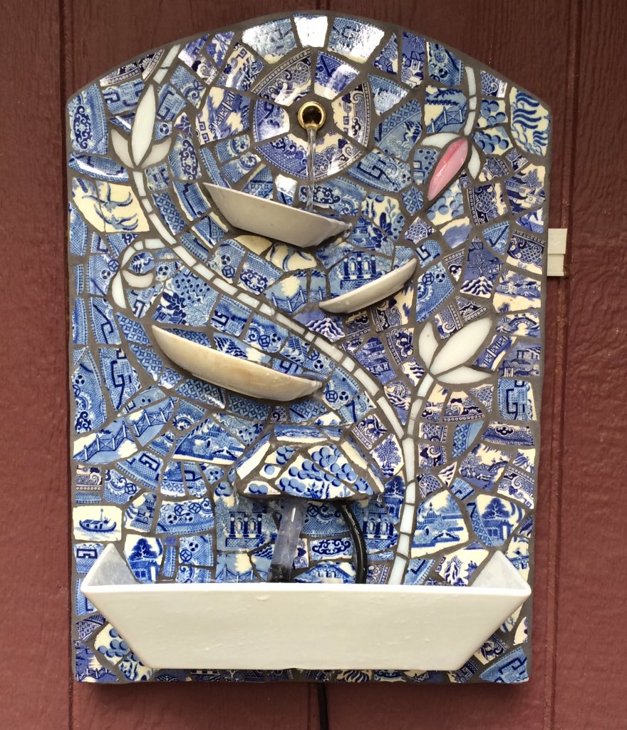 New garden fountain makes good use of broken dishes. #mosaic #nwfgs #timberpress