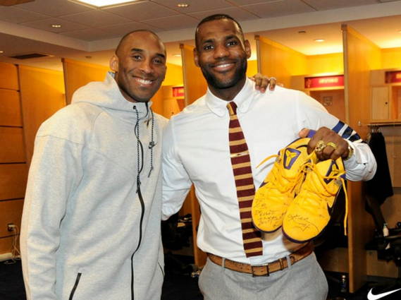 sportchatv's tweet photo. Kobe Bryant signs game-worn shoes for #LeBron James after final game in Cleveland. #Kobe #NBA https://t.co/uTeBqjLSVj