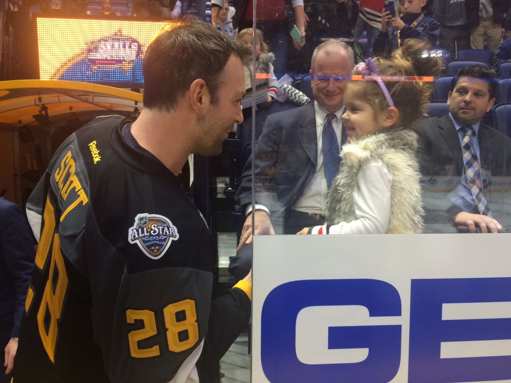 NHLMedia's tweet photo. Photo of the night? All-Star captain John Scott and his daughter at the #NHLAllStar Skills Competition https://t.co/b9QkuhRXqF
