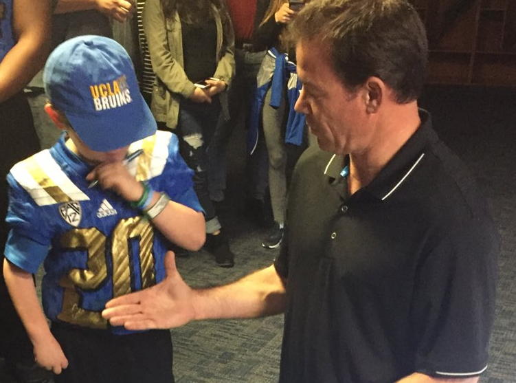BleacherReport's tweet photo. UCLA Football signs 9-year-old fan battling brain tumor to 2016 class https://t.co/ncvppv3kra https://t.co/gEuz4rtRjk