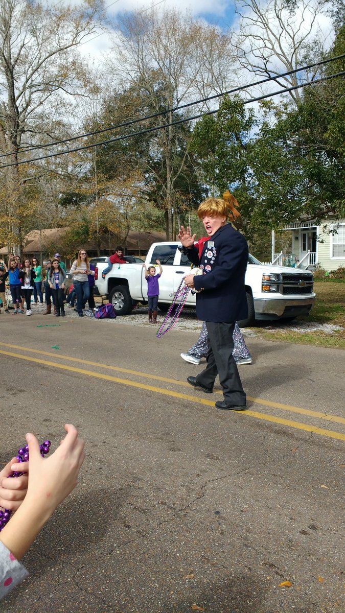 AbitaFOP's tweet photo. Donald Trump with the Tammany Trump-ettes at the 2016 Abita Springs Push-Mow Parade! #abitasprings #pushmow https://t.co/97XwgRdLcm
