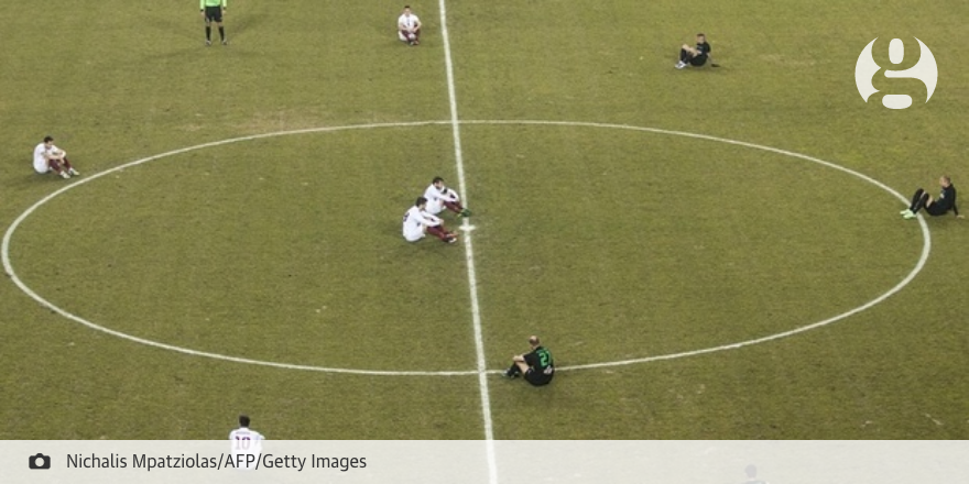guardian's tweet photo. Greek match delayed as players stage sit-down protest over migrant deaths https://t.co/B8T7V4IO7h https://t.co/VEUMHKcoJQ
