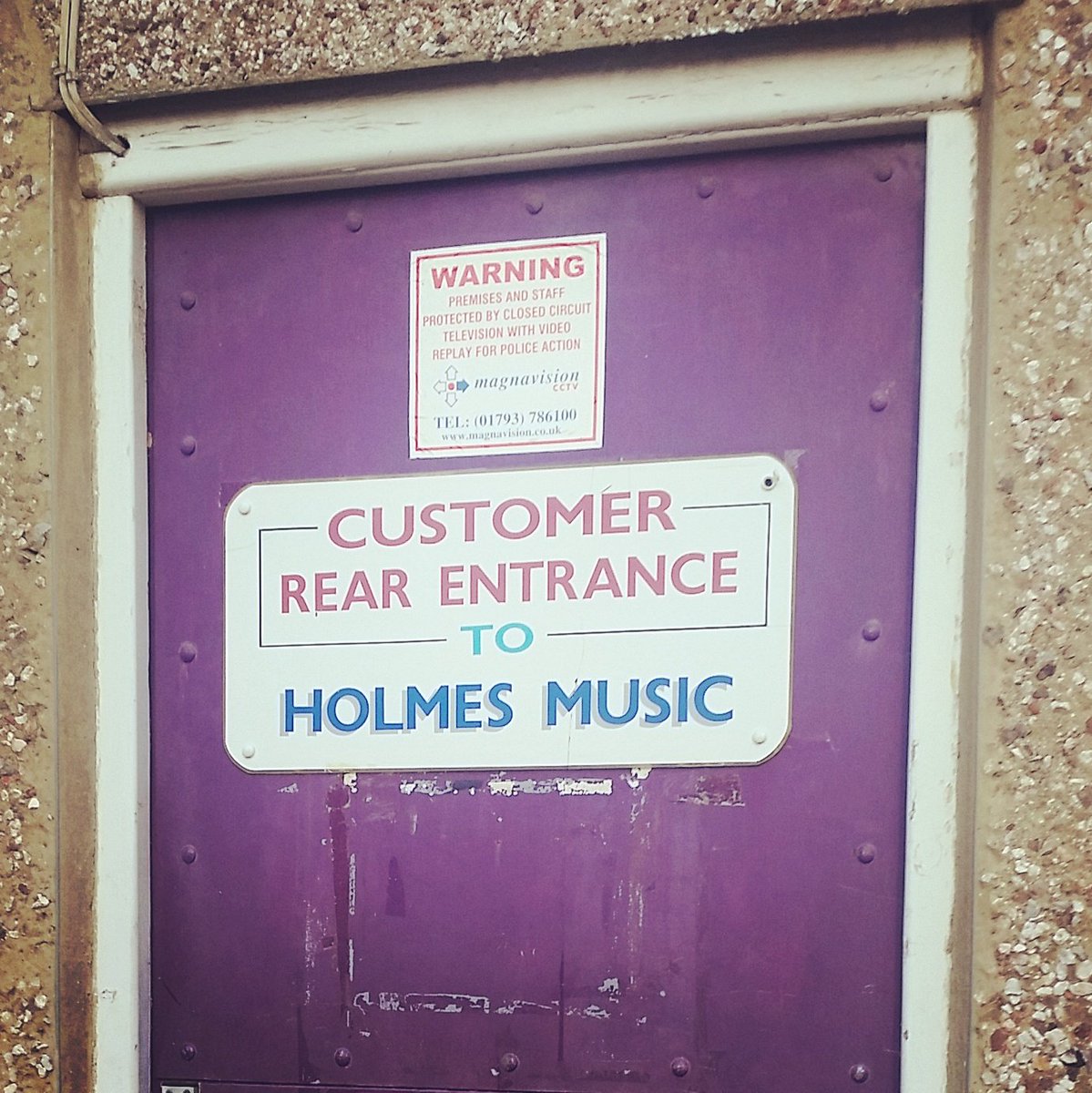 Back entrance to <a href="/Holmes_Music/">Holmes Music</a> just for the cool kids
