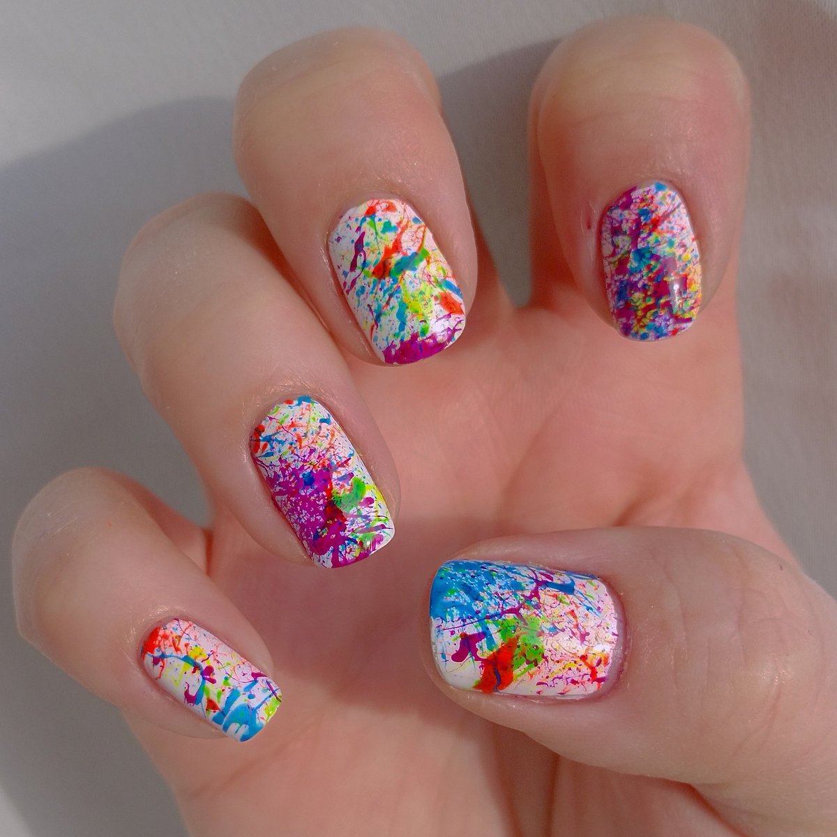 sezjeuric's tweet photo. Here are my #splatternails for last night's 🎨 party. I 💖 the #neon! #nailart #notd 💅 https://t.co/pe02NoaBQ3