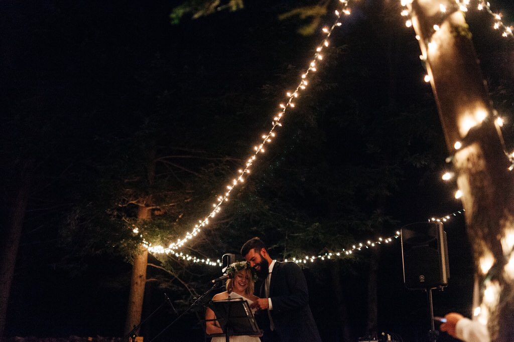 Giggly toasts, hearts full of love, twinkling lights, and a full moon. The best. #muskokawedding #forestwedding