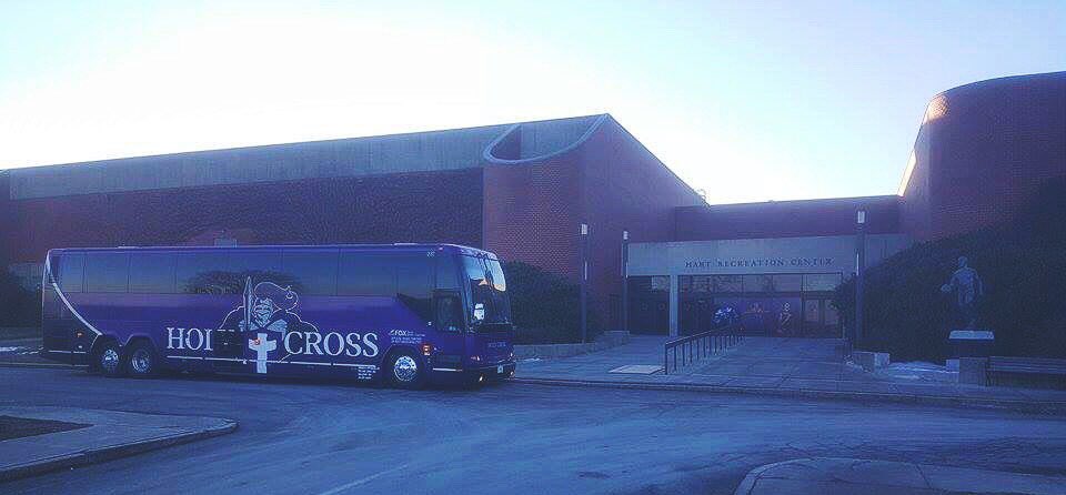 SilverFoxCoach's tweet image. Our driver took this picture of the wrapped @GoHolyCross bus in front of the Hart Center. Looking good!