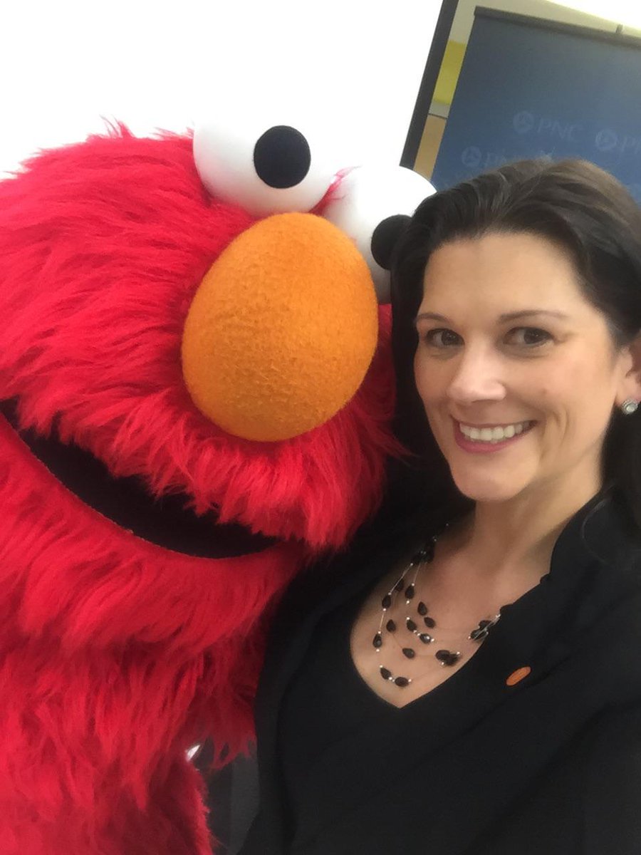 ZorayaSuarezPNC's tweet photo. .@PNCBank's @KimReckley gets a hug from #Elmo at the #earlylearningeducation grant event for @PBStateCollege https://t.co/XvGvwgkQK6
