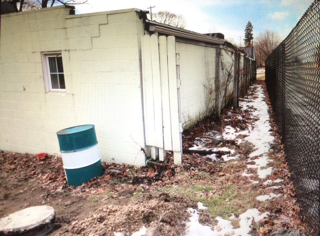 Body found behind Galesburg building across the street where man left van after crashing into tree. <a href="/Kzoo_Gazette/">Kalamazoo Gazette</a>