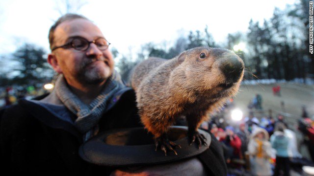CNN's tweet image. Spring is coming! It's #GroundhogDay and Punxsutawney Phil predicts early springlike weather cnn.it/1TzHknd