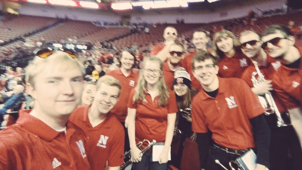 UNLTrumpets's tweet photo. The #BRETrumpets stick together in ALL KINDS OF WEATHER for @HuskersWBB! Let's go Ladies! #Huskers #GBR https://t.co/paKzChnLU0
