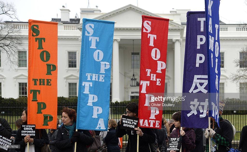 FlushtheTPP's tweet photo. In global solidarity to #StopTPP https://t.co/7JYv1hhIx8 #TPPANoWay #ShutitDown #AltoalTPP @fightfortheftr @foe_us https://t.co/cOHXamlebV