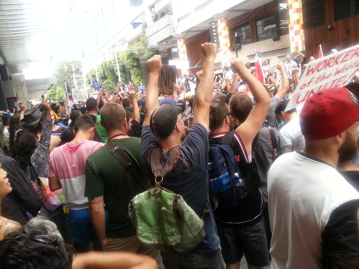 350nz's tweet photo. Protesters chant at blockade in front of the Grand Hotel #TPPABlockade #TPPAFreeZone #TPPA https://t.co/tMT2NA7zQS