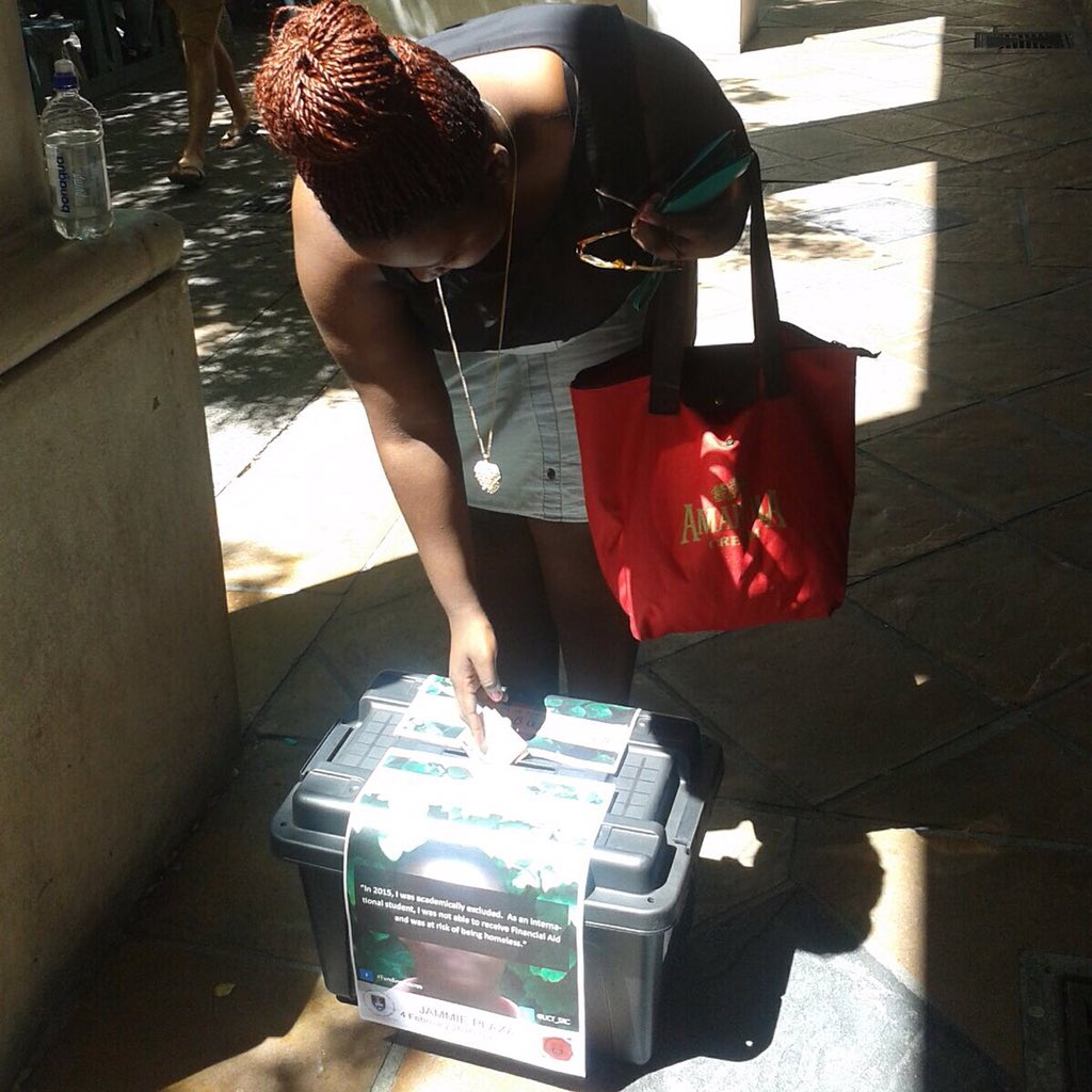 UCT_SRC's tweet image. Student donating to #FundingFutures - look out for the donation boxes around campus