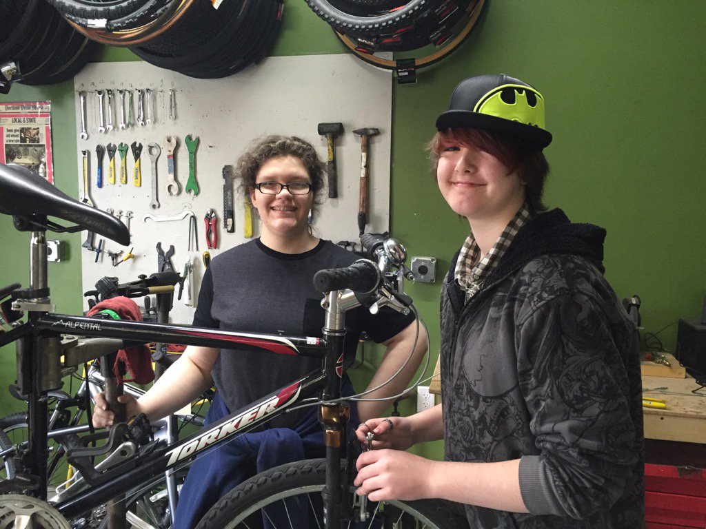 CBC_Biddeford's tweet photo. BMS students putting service above self into practice fixing bikes for BLAST students. https://t.co/5WUlTpKESq