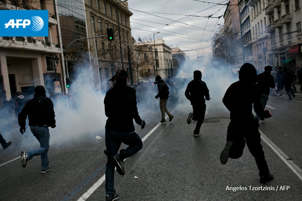 Souidos's tweet photo. Demonstrators run during a massive protest next to the Greek parliament in #Athens #apergia #antireport #4febgr https://t.co/iRYjEW4JZ5