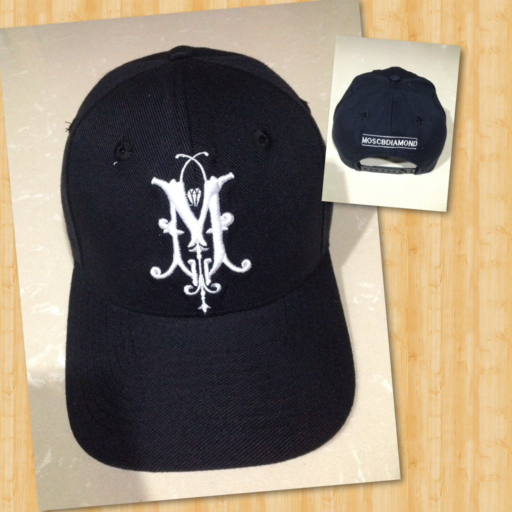 Logo M white 150K