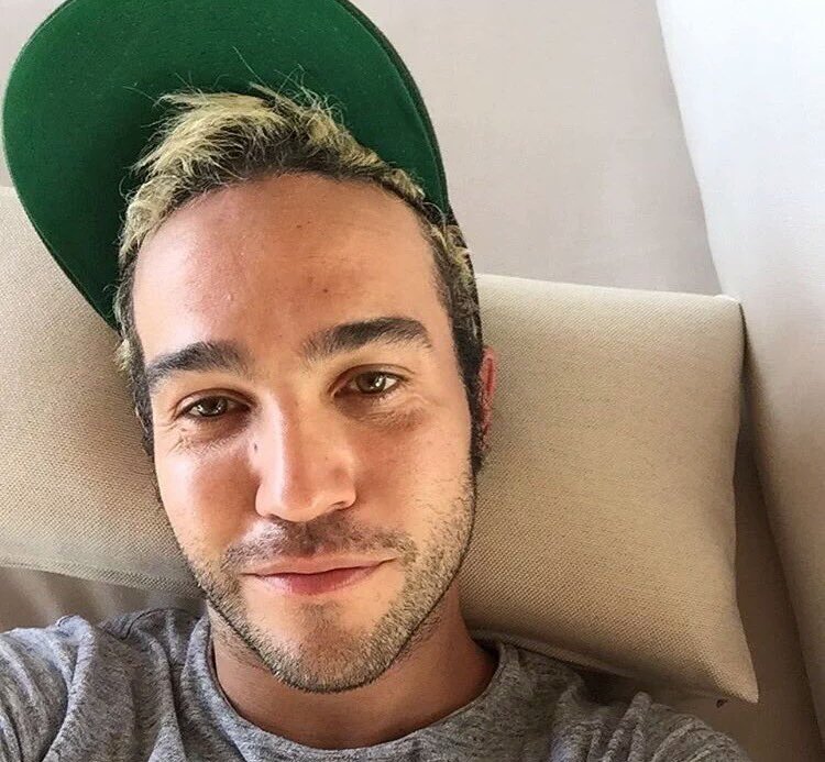 ||: Josh is the one with the drumsticks, Brendon is the one with the cheese hat, Pete is the one with the green hat.