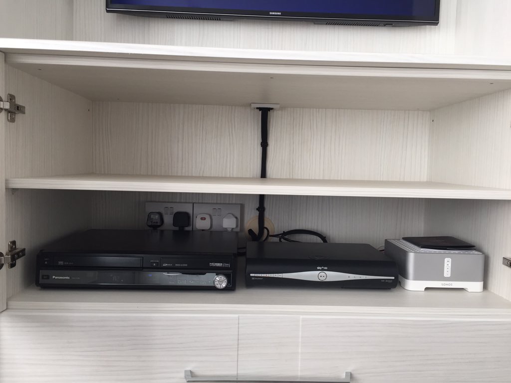 A clients new bedroom with Sky TV, Sonos with a pair of Kef in ceiling speakers and a retro DVD/VCR machine.