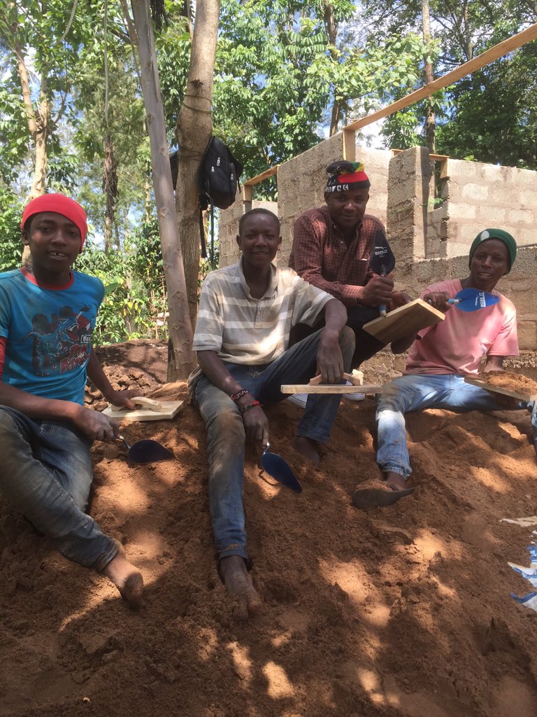 housethatZbuilt's tweet photo. We have 4 street kids learning a trade on this project. Here they are with their new tools #youth #youthdevelopment https://t.co/gZ8om5Xa5Y