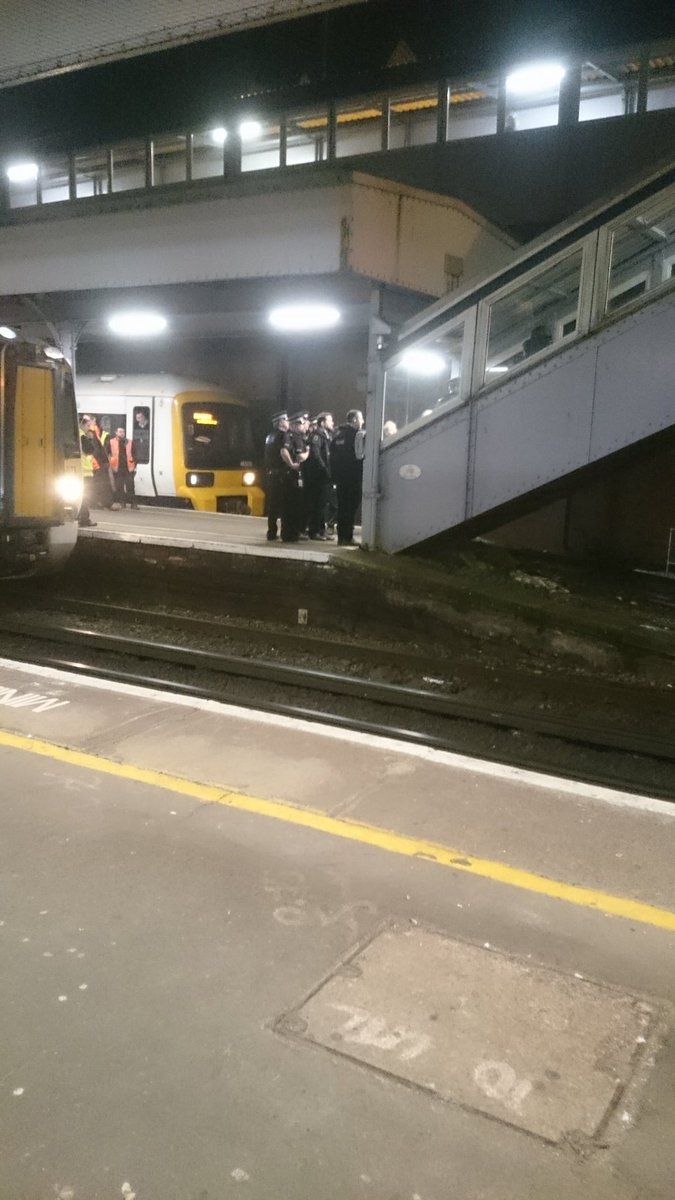 Kent_999s's tweet photo. RT GILLINGHAM update: @grc1690 Armed police at Gillingham station, surround train, 50 cops at least. https://t.co/Gk95nXCIN6
