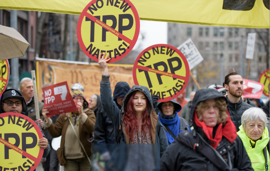 FlushtheTPP's tweet photo. #Seattle marched yesterday: "#TPP is betrayal" #StopTPP #TPPANoWay #AltoalTPP https://t.co/lcEc1T0Jv7 @backboneprog https://t.co/L70L8PEapA