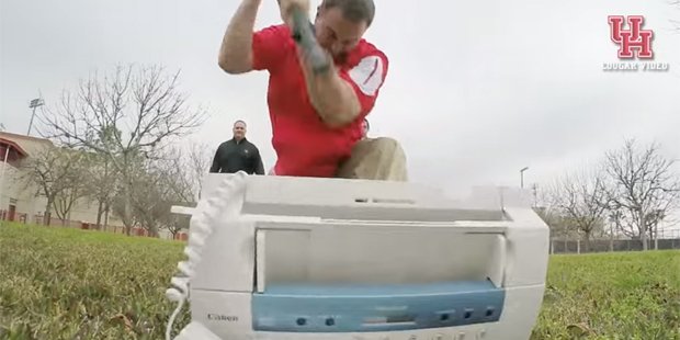AZSports's tweet photo. Houston coaches go Office Space on fax machine following NLI Day. #HaboobBlog https://t.co/dDxr406XvL https://t.co/t6mdJu3vj9