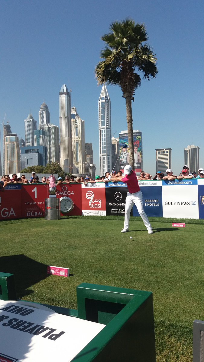 EmiratesGC's tweet photo. Defending champion @McIlroyRory tee's off for round 2 of the Omega Dubai Desert Classic #oddc2016 https://t.co/iLTSXz5Dyy