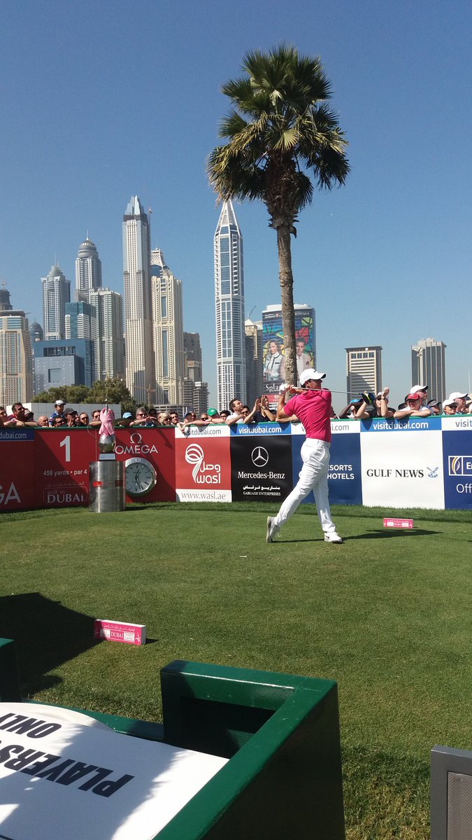 EmiratesGC's tweet photo. Defending champion @McIlroyRory tee's off for round 2 of the Omega Dubai Desert Classic #oddc2016 https://t.co/iLTSXz5Dyy