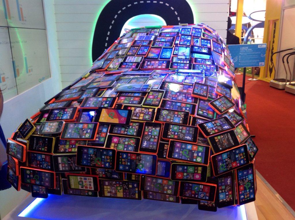 bankavivek's tweet photo. This sleek #MobileCar at #AutoExpo2016 has been made using 2000 mobile phones. #AETMS16 https://t.co/uZV5Jl8B1o