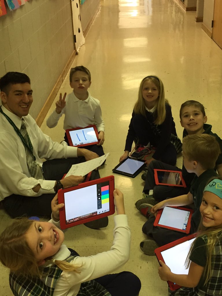 MrsLKelly_SMA's tweet photo. Mr. C working on addition facts with first grade students at #coolCatholicschool https://t.co/zngPo5Iiaj