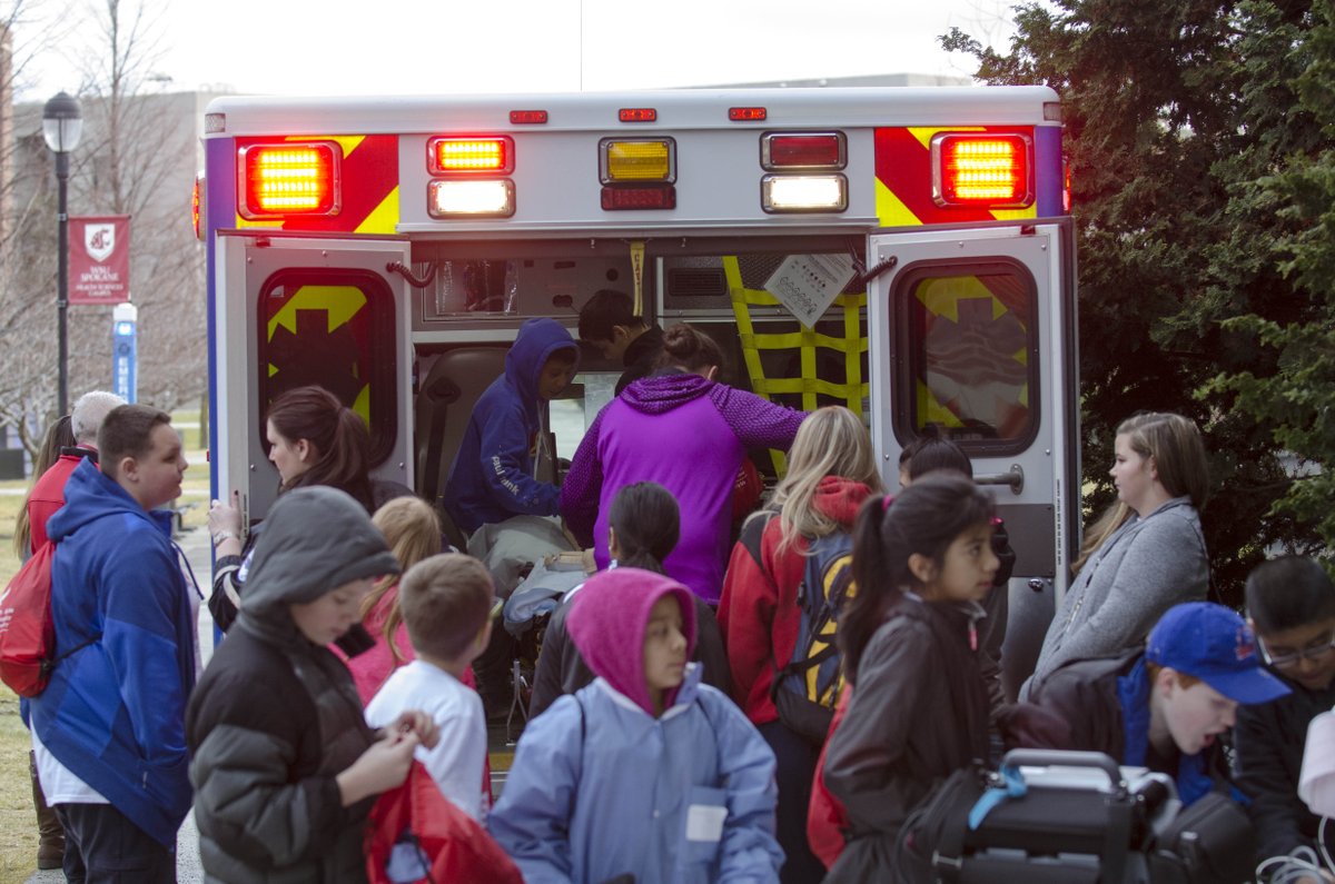 Sleep Over for Science participants getting a close look at EMT life. Thanks <a href="/AMR_Social/">American Medical Response</a> for your help!