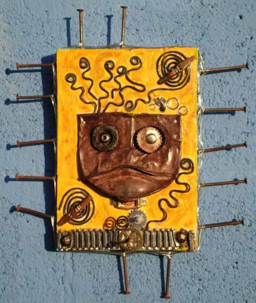 electricnomad1's tweet photo. Made from found objects.  My sad robot. #handmade #art #upcycled #etsysellers https://t.co/h1TC73rzQZ