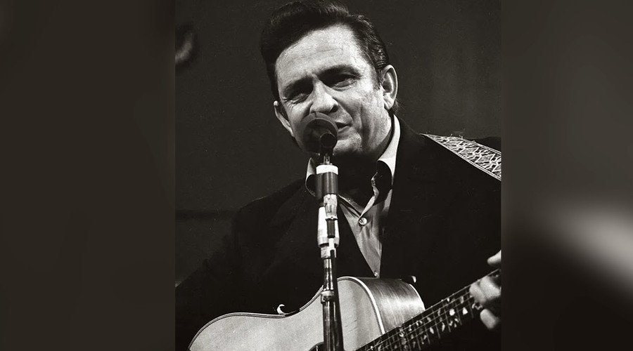 RT_America's tweet photo. Spider in black: Scientist names tarantula after Johnny Cash https://t.co/fkgtM3bCQM https://t.co/eIPUAdk6Ci