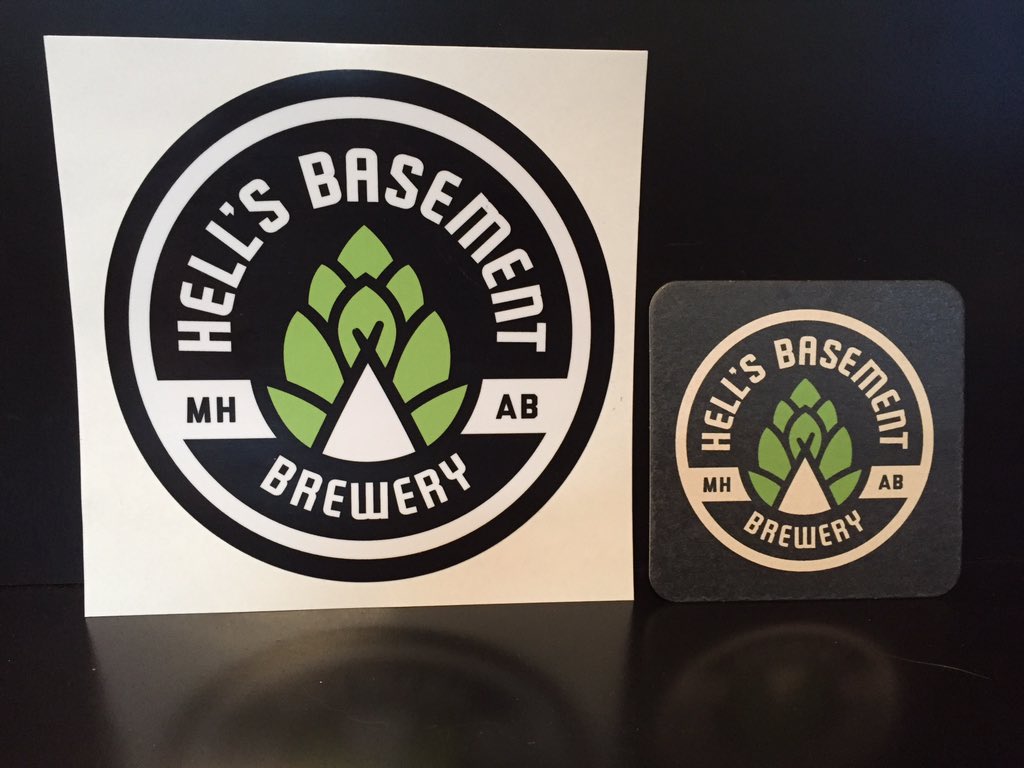 HellsBasementMH's tweet photo. Some prototype Hats, coasters, and stickers. Very sharp looking. #hellofabeer https://t.co/2swYNvk5TX