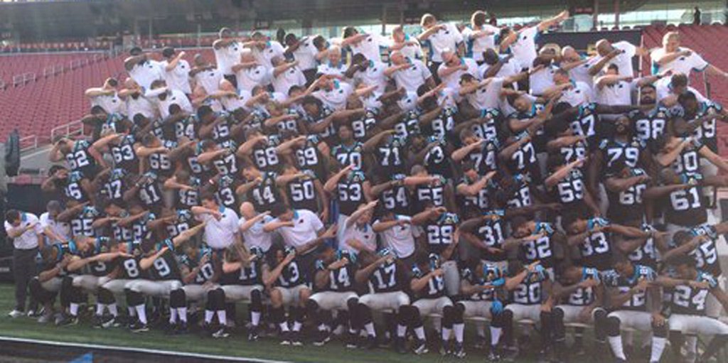 AroundTheNFL's tweet photo. Look at their dab! Panthers dab in team photo on eve of Super Bowl
https://t.co/HlCGPD6AfQ https://t.co/AhI3hdHoE8