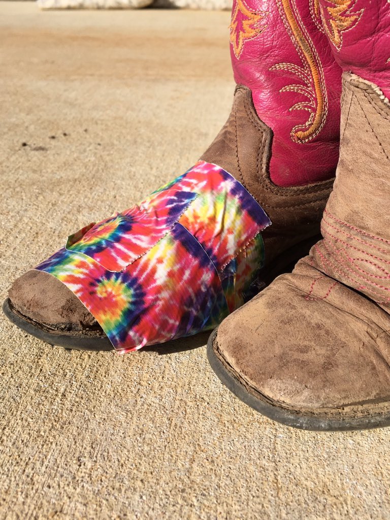 Christi2117's tweet photo. My 8yo "I don't need new boots, these are just fine! I fixed 'em to match @FallonTaylor3 !" #timefornewboots #holes https://t.co/wHpV4WrN5T
