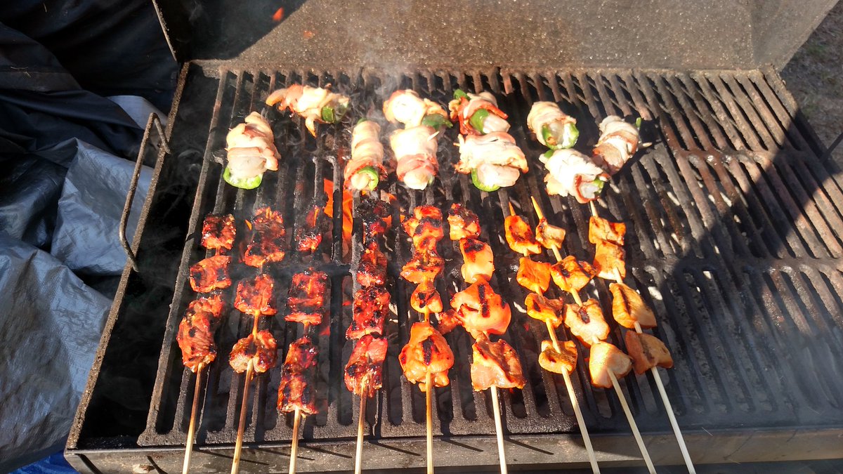 VanceMaack's tweet photo. Food on the grill. Shrimp wrapped in bacon pork, chicken beef skewers #GiadaEats #SB50 #SB50Eats https://t.co/K12cKHq5ki